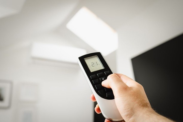 Ductless mini-split indoor unit mounted on a wall providing zone cooling