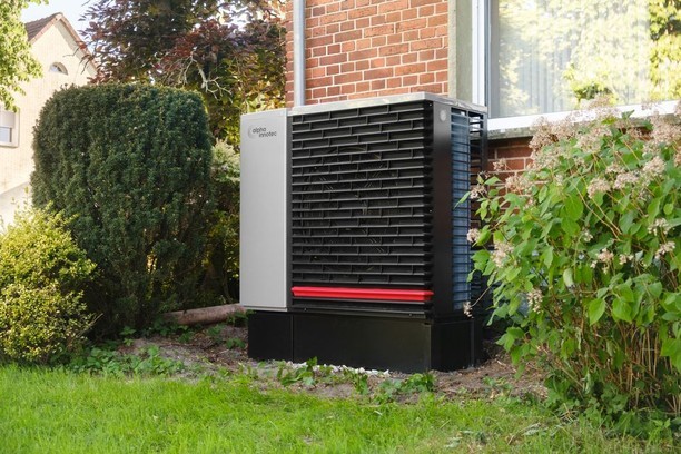 Outdoor air conditioning condenser units installed outside a residential building